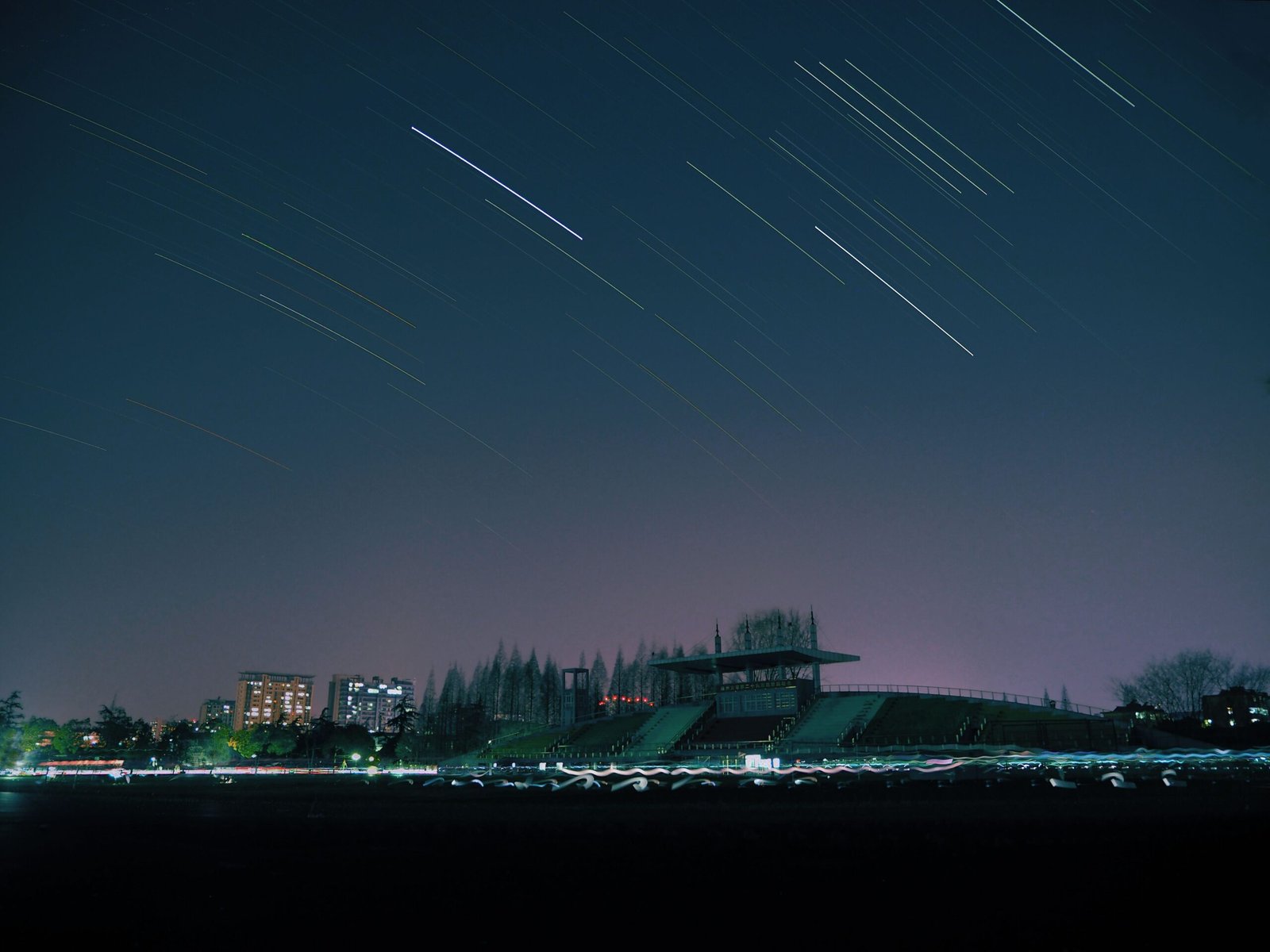 A professional landscape photograph capturing dark metropolitan skylines representing the urban context where the Aqaba Jordan air defense missile interception event tracks
