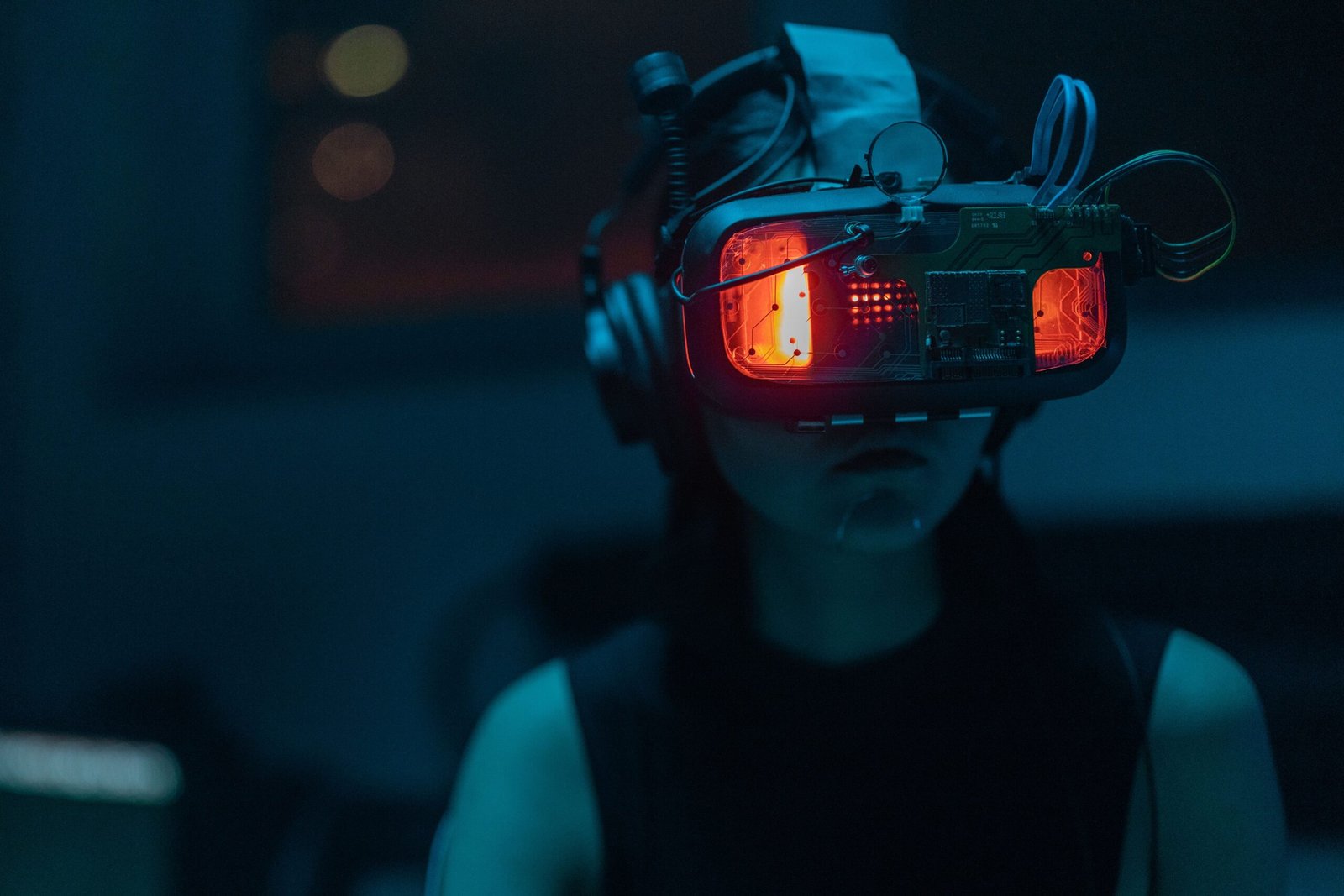 A modern clean shot of a spatial computing headset displaying vibrant abstract sound wave visualizations.