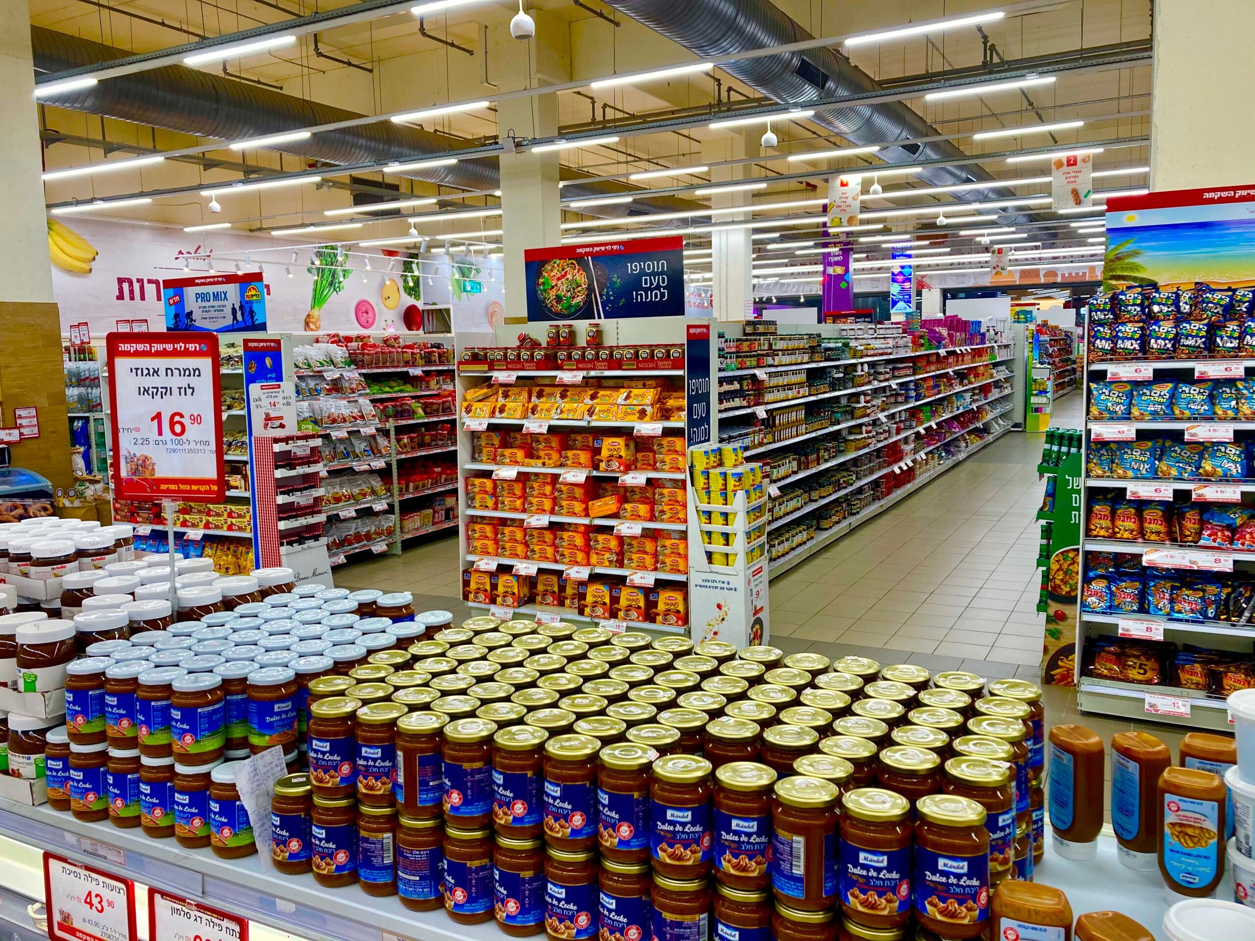 A modern clean grocery store aisle with fresh produce representing a retail supermarket environment