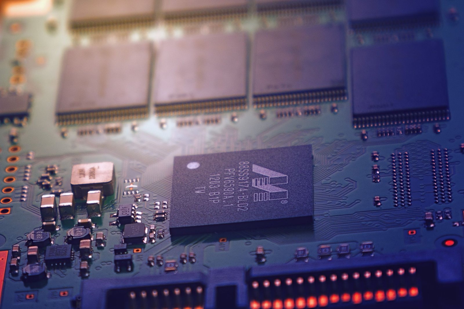 A high-tech macro photograph of an advanced GPU microchip substrate glowing inside a server rack.