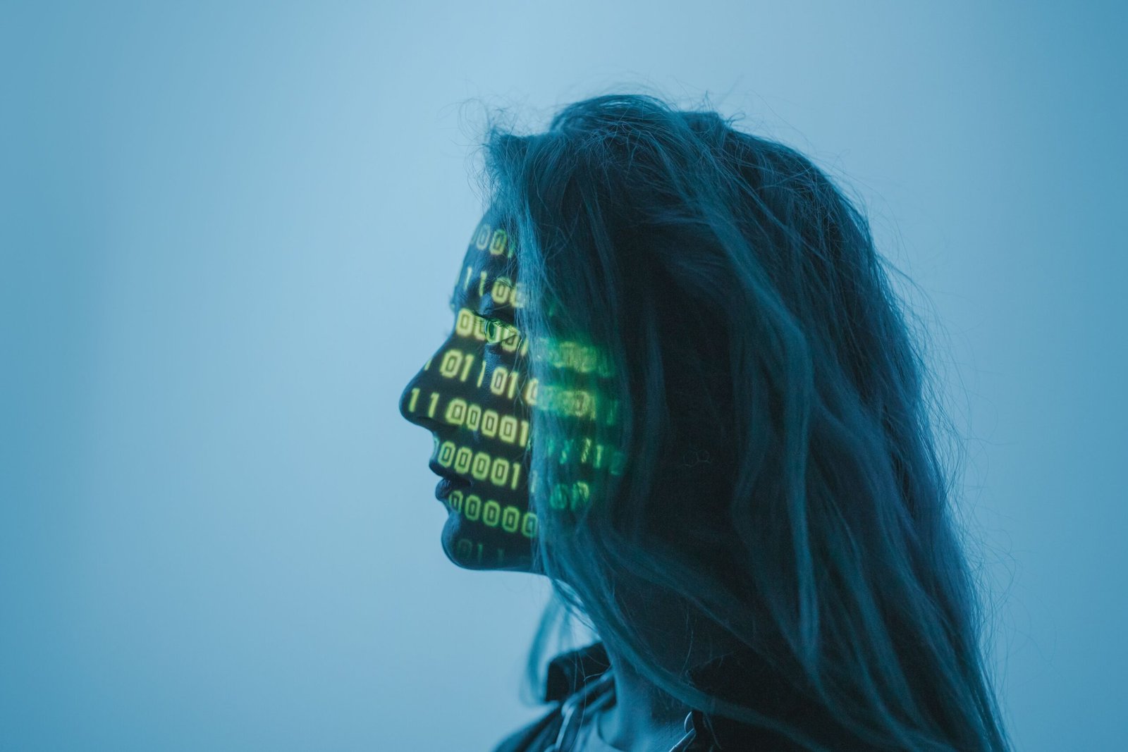 A high-tech digital lock graphic overlaying lines of glowing binary software code.