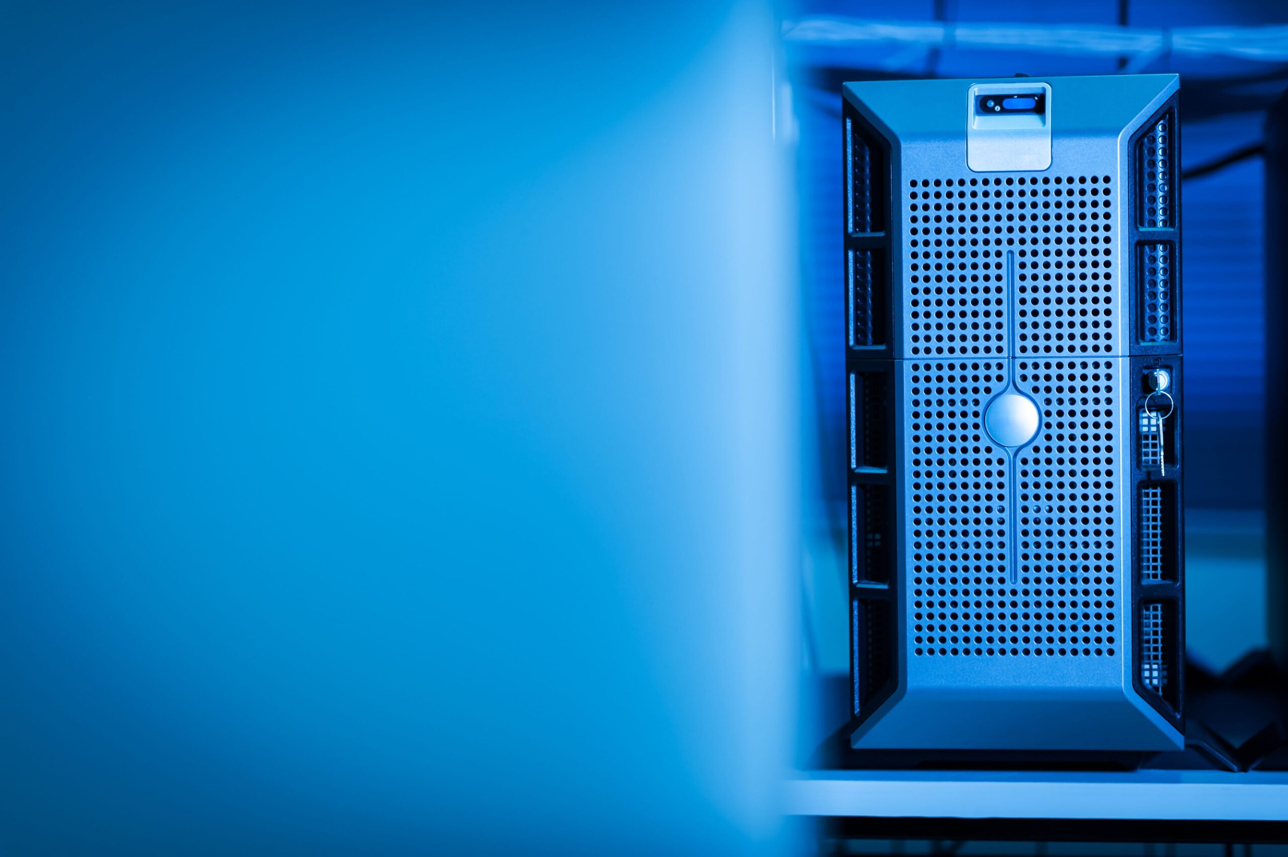 A professional technology journalism photograph showcasing intricate blue holographic data processing streams moving through advanced computer servers