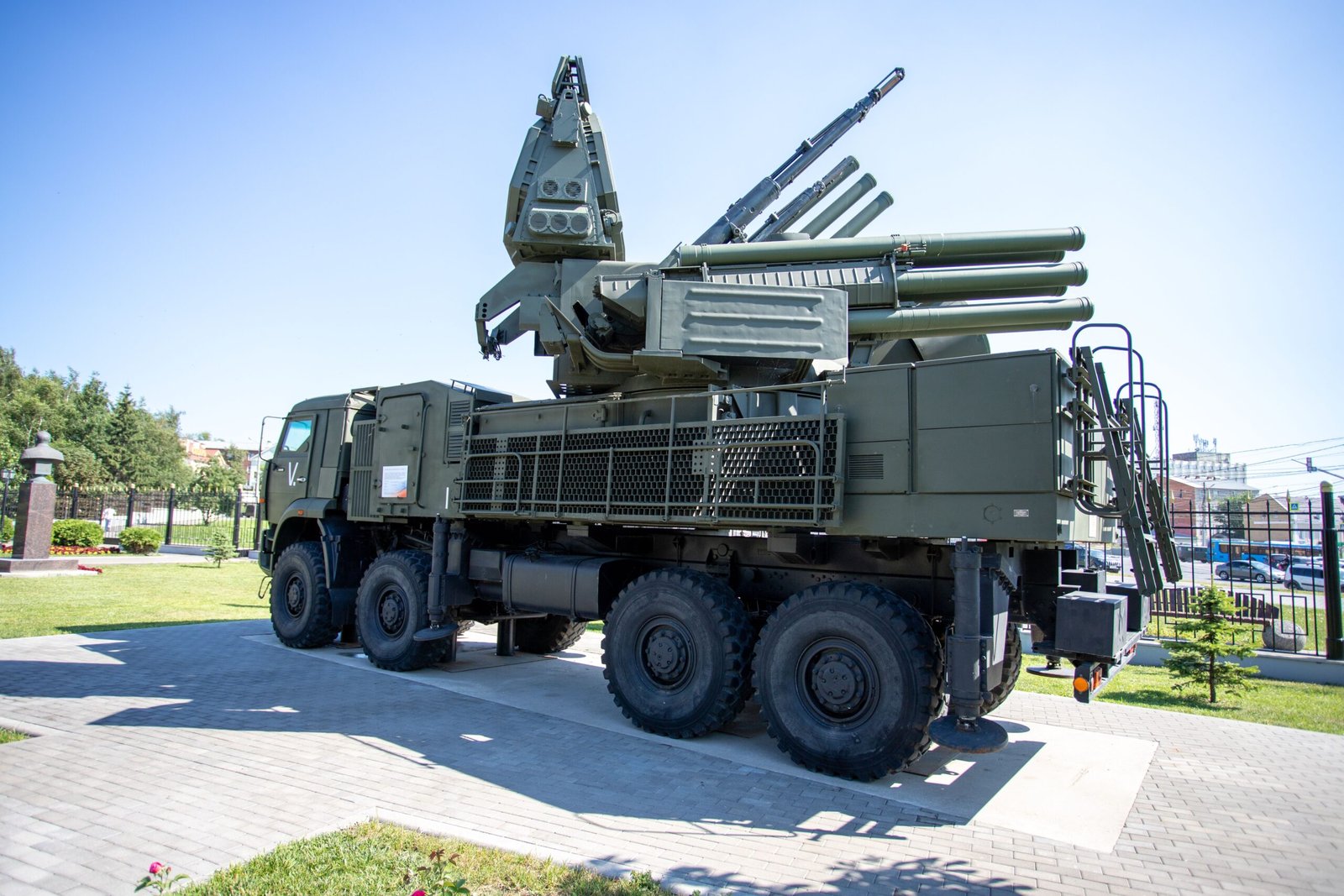 Lockheed Martin Patriot missile system launcher firing a PAC-3 MSE interceptor rocket against a high-contrast sky background