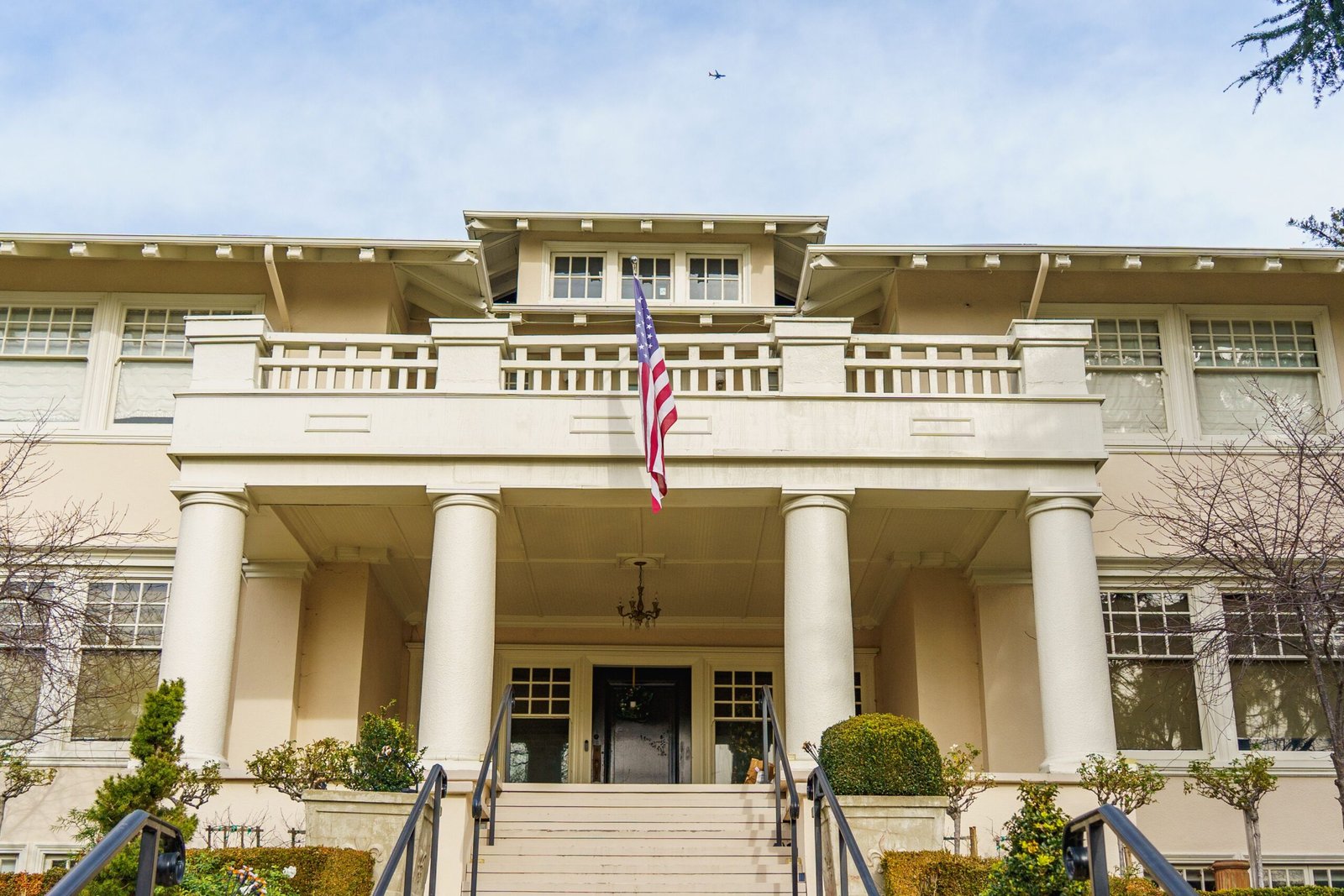 A professional architectural photograph capturing administrative building facades representing how the context of President Trump addresses the nation infrastructure mandates develops