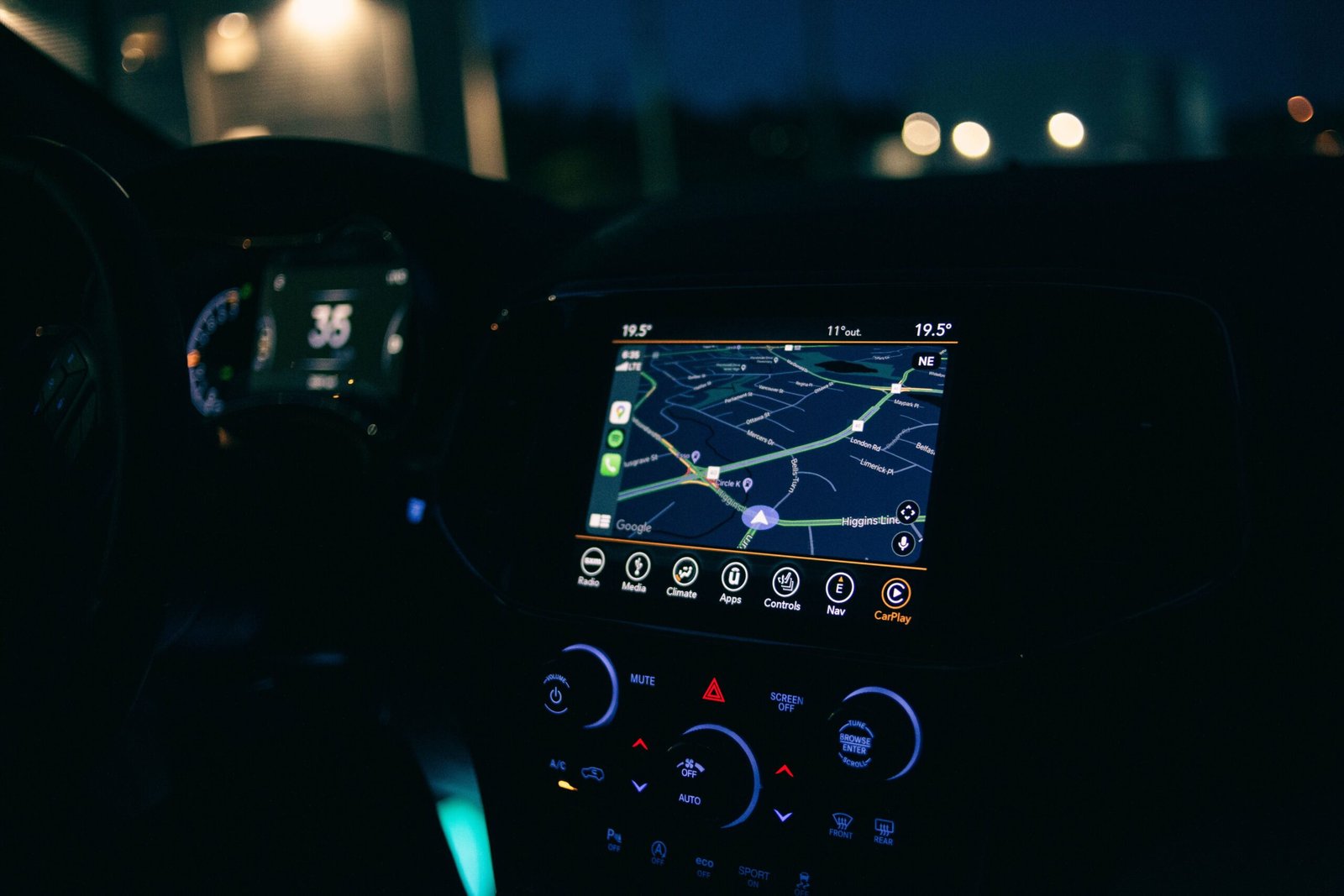 A professional automotive technology photograph capturing digital mapping user interfaces representing how the Waze navigation framework route optimization operates