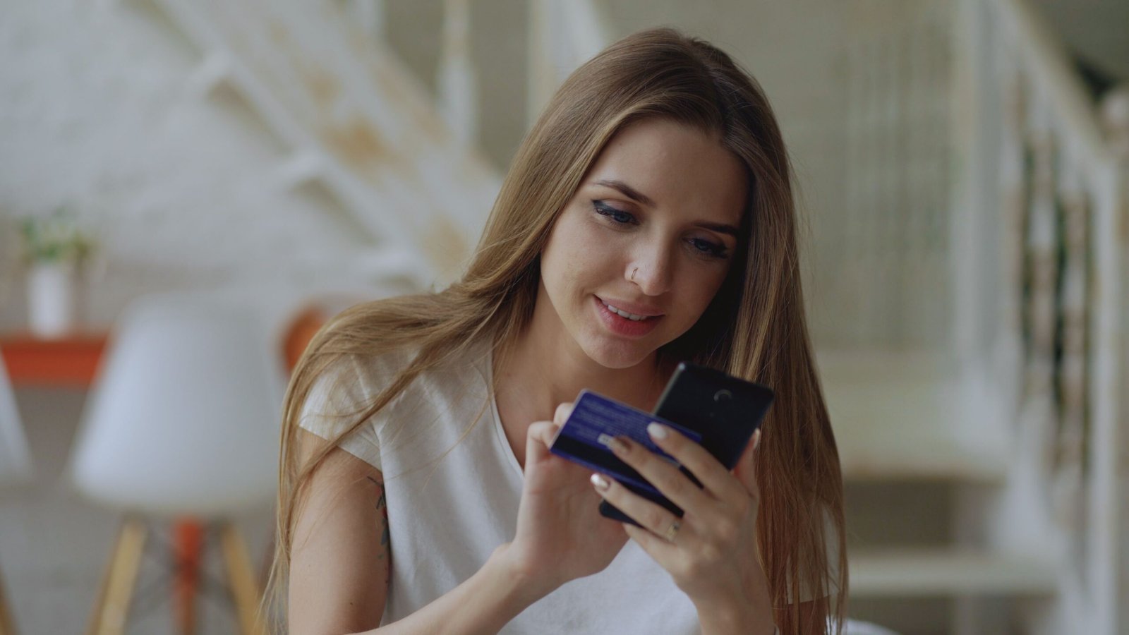 Smartphone screen displaying X Money digital payments dashboard showing peer to peer transfer options and wallet balance