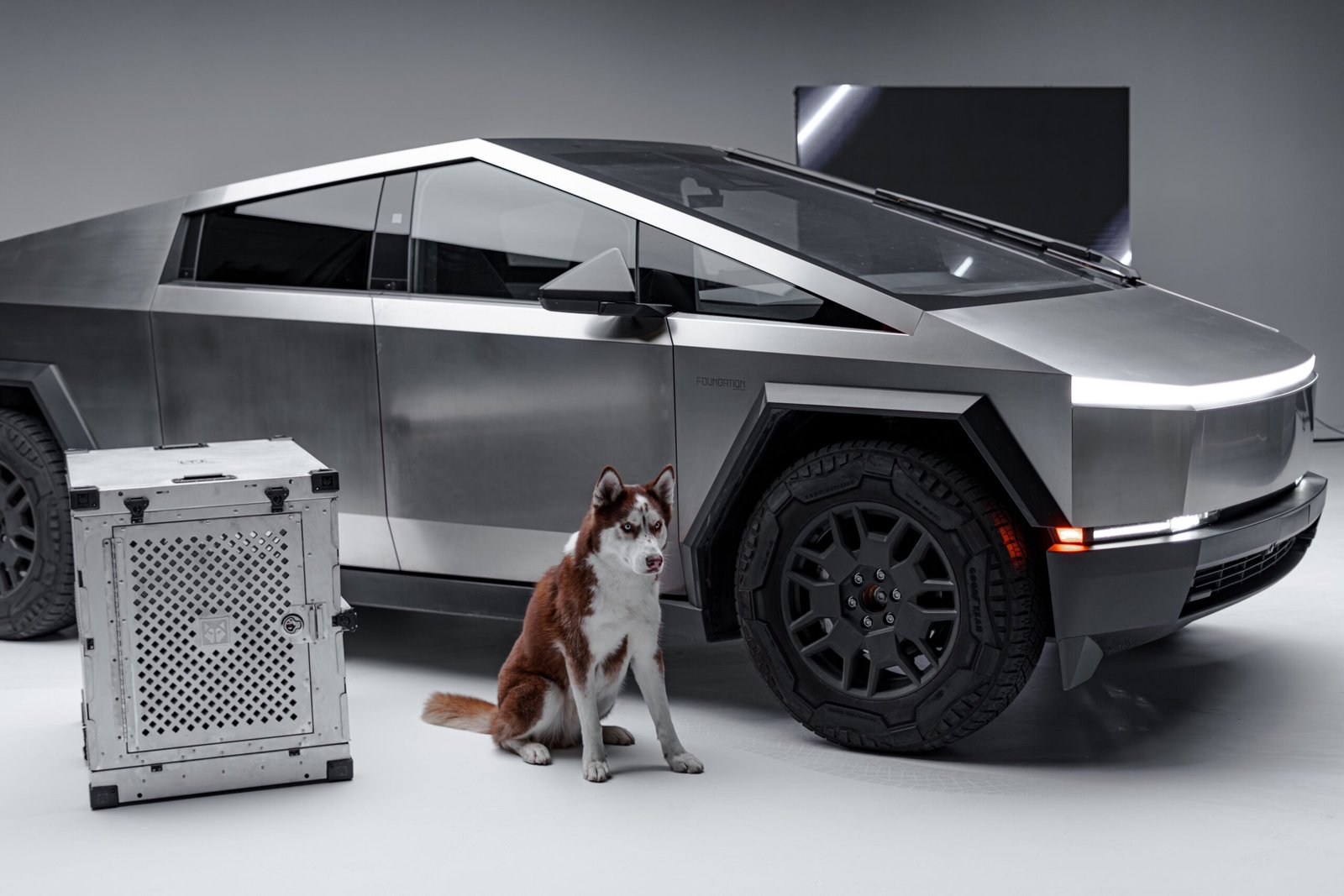 Conceptual rendering of a Tesla Cybertruck and a SpaceX Starship rocket against a futuristic cityscape