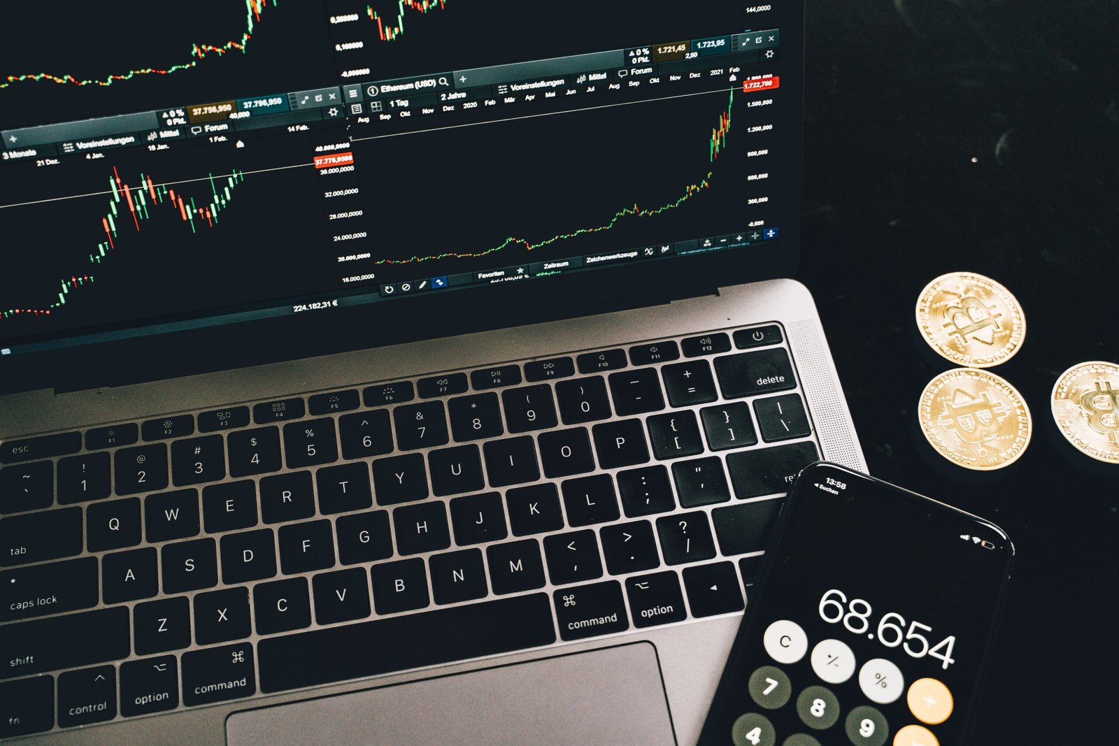 Digital cryptocurrency trading chart display featuring Bitcoin and Ethereum market indicators alongside hardware cold wallet