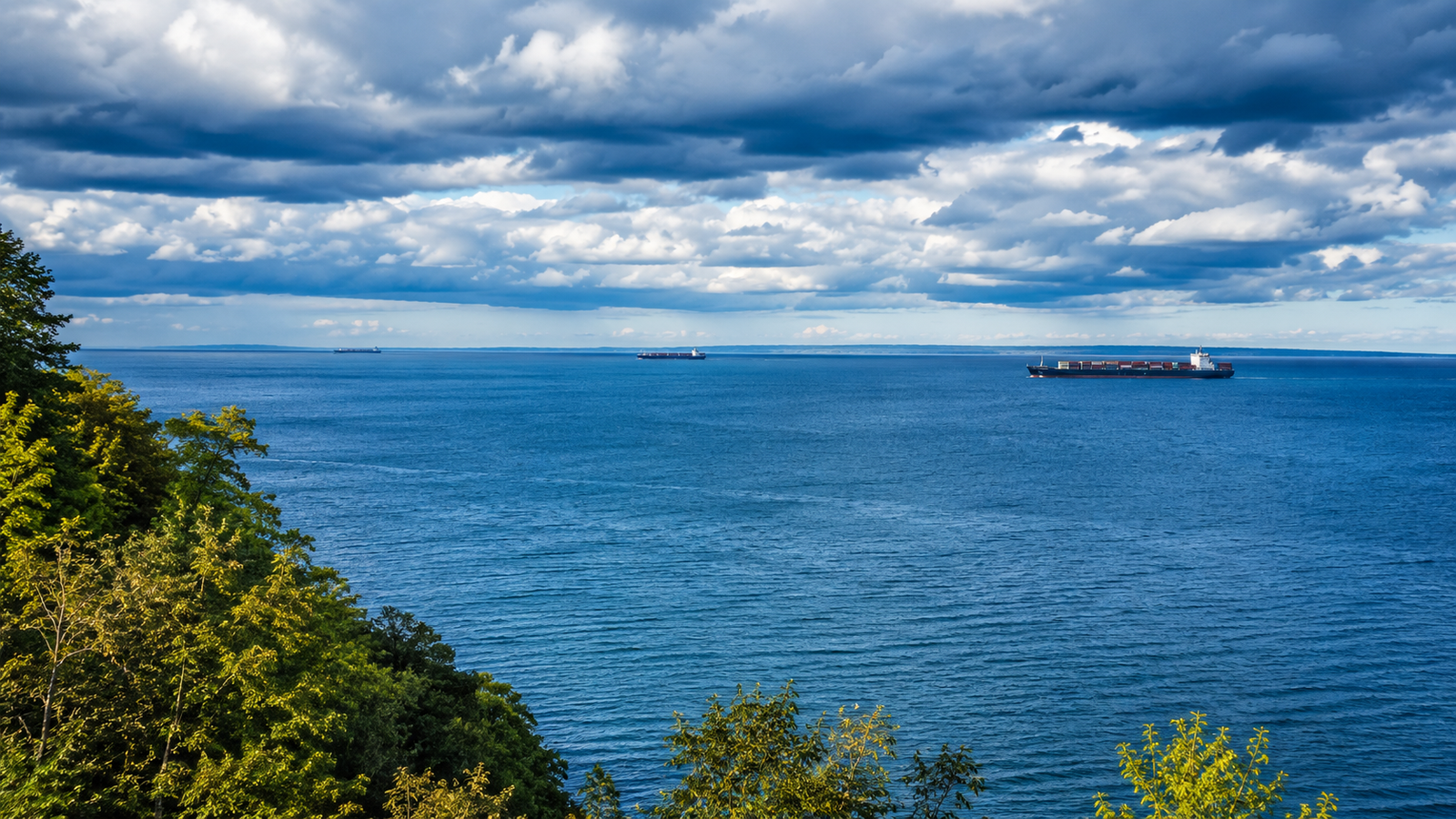 A high-angle landscape of Lake Ontario waters along the US and Canada border